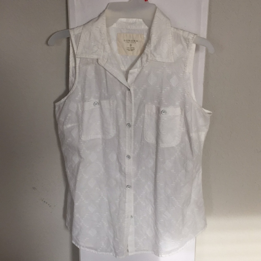 White sleeveless top